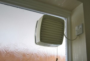 An ugly, inadequate extractor fan in a UK home