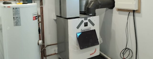 Installed Zehnder Q350 MVHR HVAC with pre-heater in a home utility room