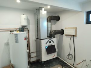 Installed Zehnder Q350 MVHR HVAC with pre-heater in a plant room