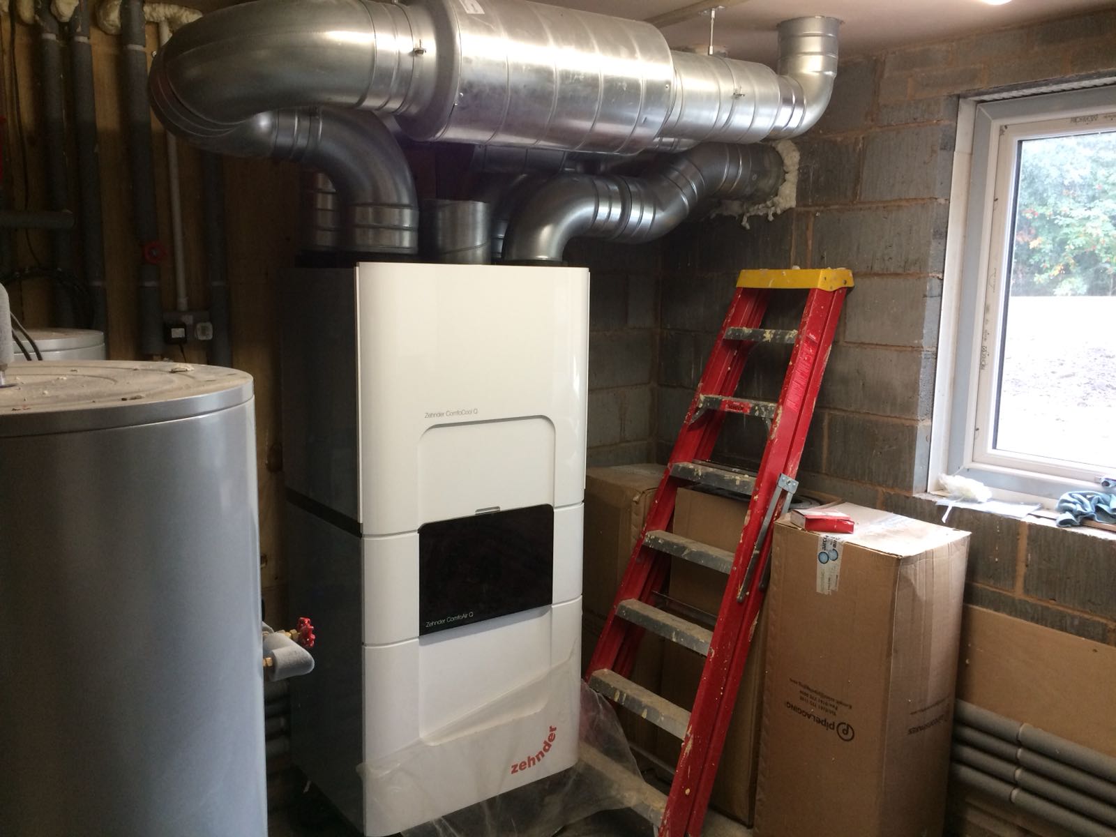 MVHR with ComfoCool installed in a residential home showing spacing requirements