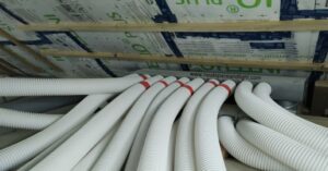 90mm diameter MVHR ducting fitted into a radial manifold in a low energy Home