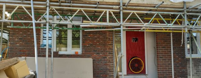 Airtightness pressure test kit installed in retrofit home achieving 1 score