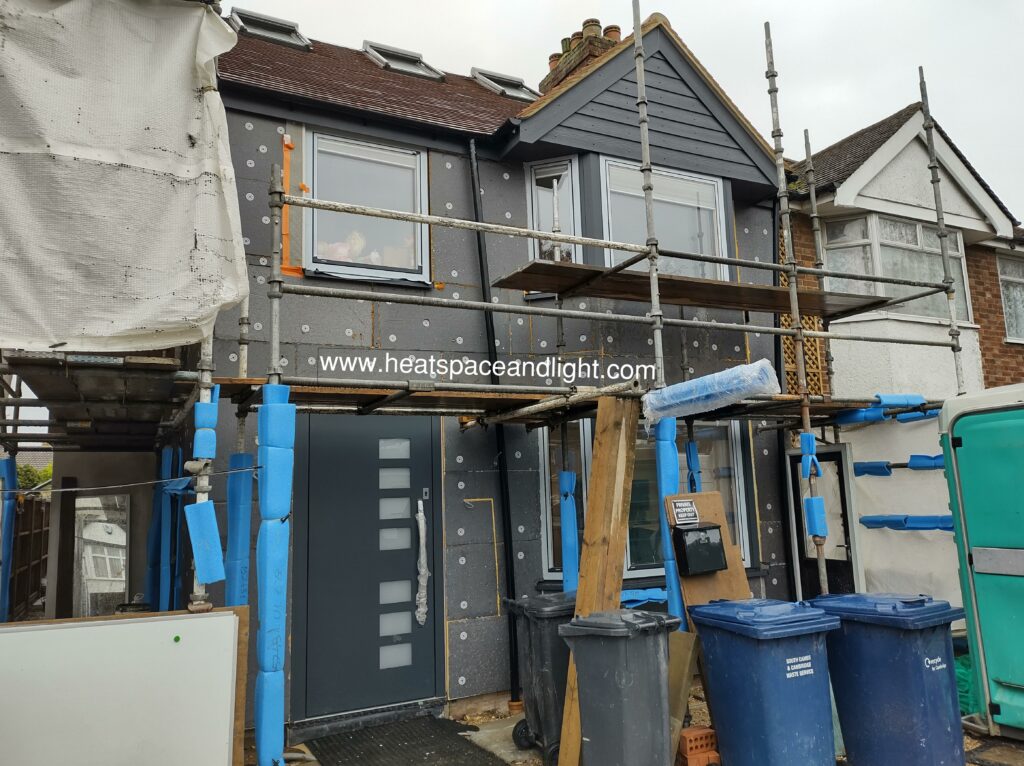 External insulation being installed on a UK home exterior