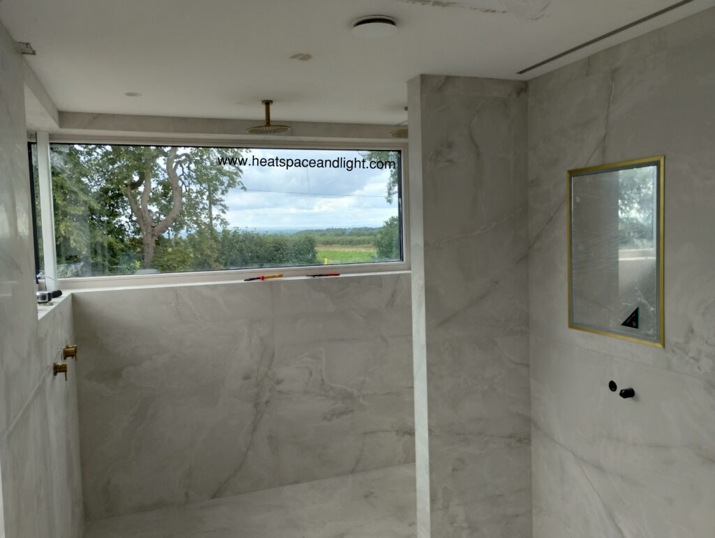 MVHR extract valve in all marble luxury bathroom